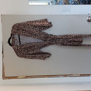 Free with any purchase. Leopard print bathrobe